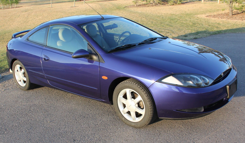 Illustration for article titled For $5,000, Is This Low-Mileage 1999 Mercury Cougar V6 The Cat’s Meow?